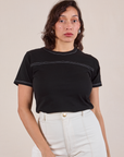 Tiara is 5'4" and wearing XXS JV Tee in Basic Black