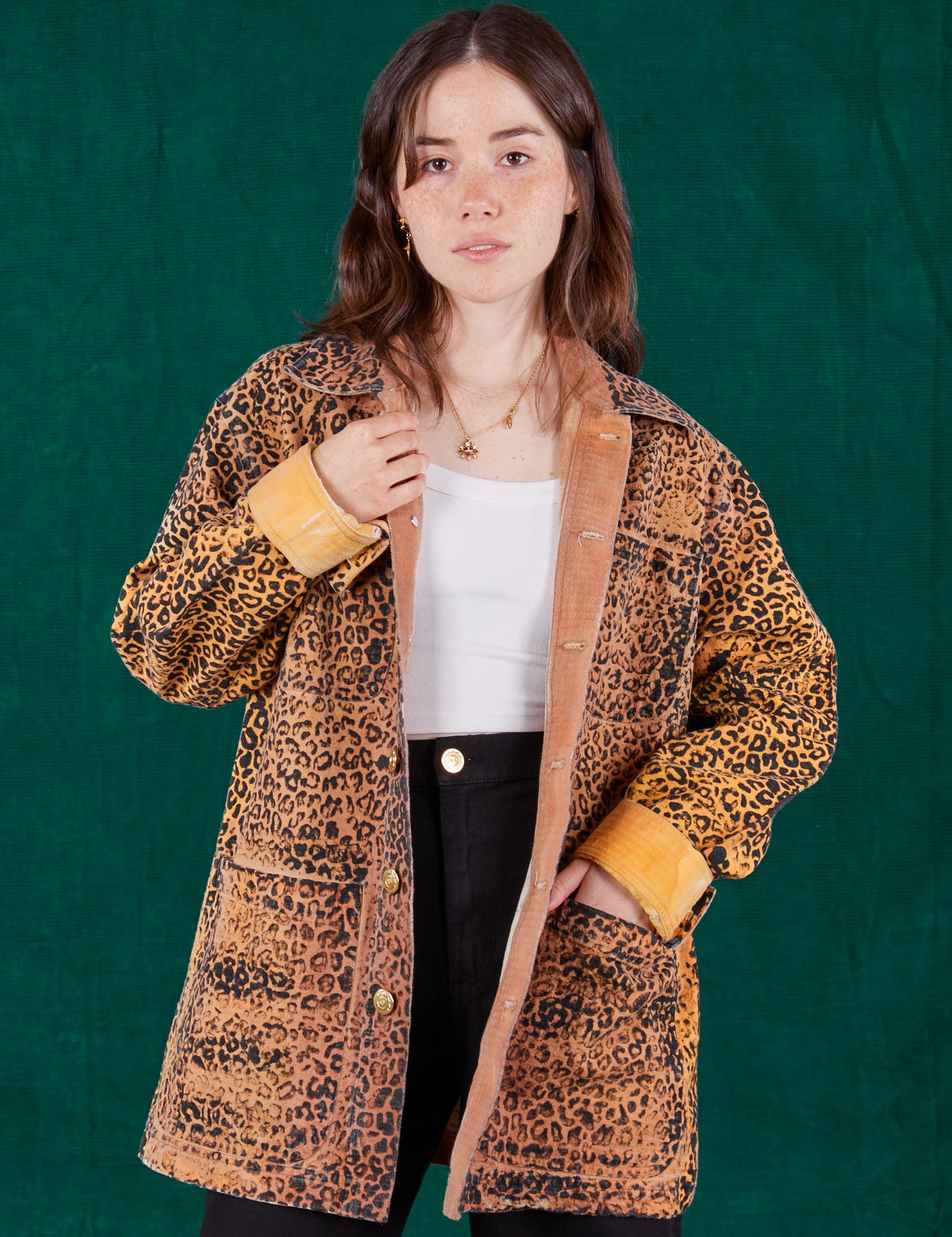 Hana is 5'3" and wearing XXS Field Coat in Leopard Print paired with vintage tee off-white Cami underneath