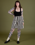 Sydney is wearing Longline Work Shorts in Natural and Cropped Tank in Black