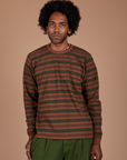 Jerrod is 6’3” and wearing M Long Sleeve Striped Burly Tee in Fudgesicle