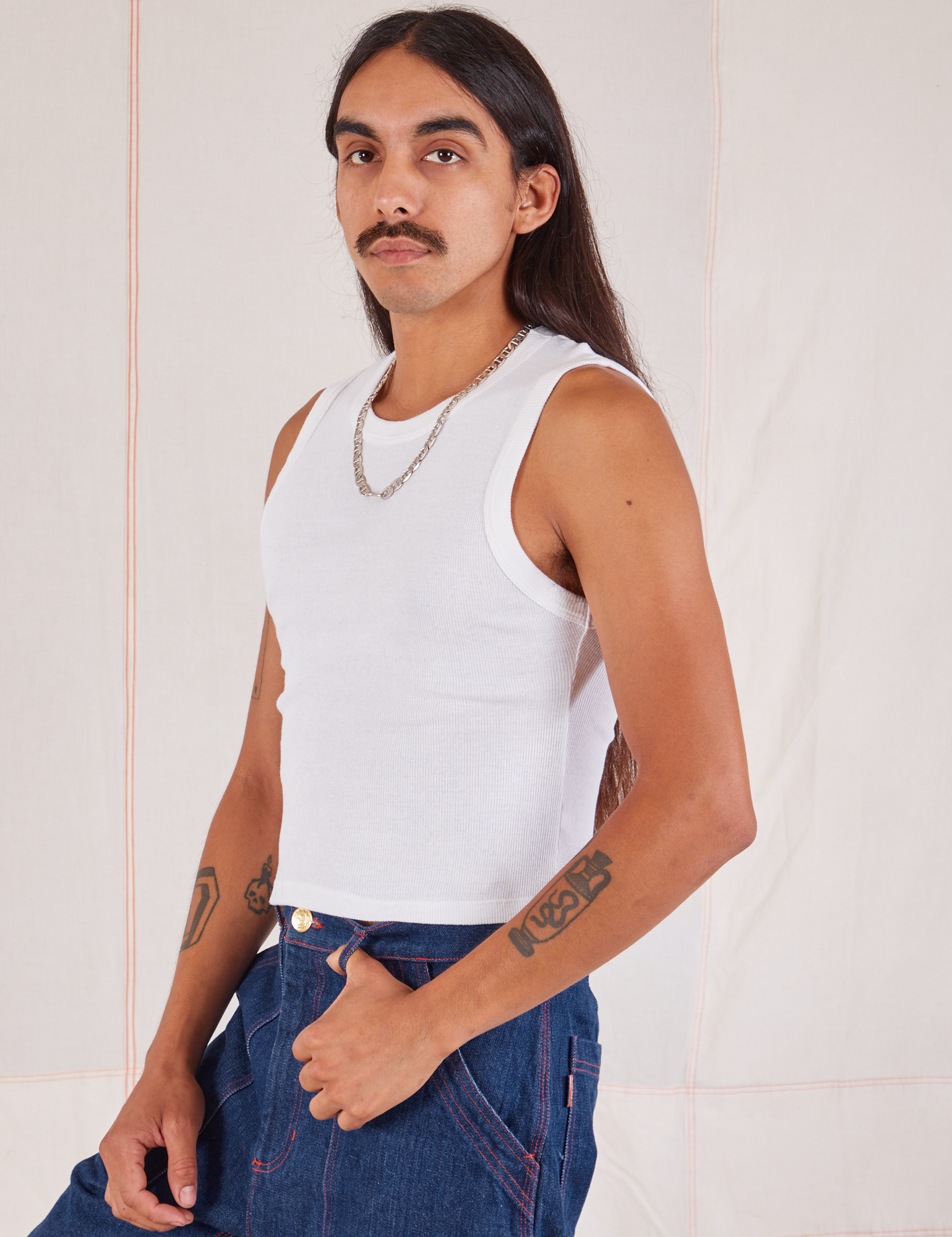 Muscle Tee in Vintage Tee Off-White angled front view on Anthony
