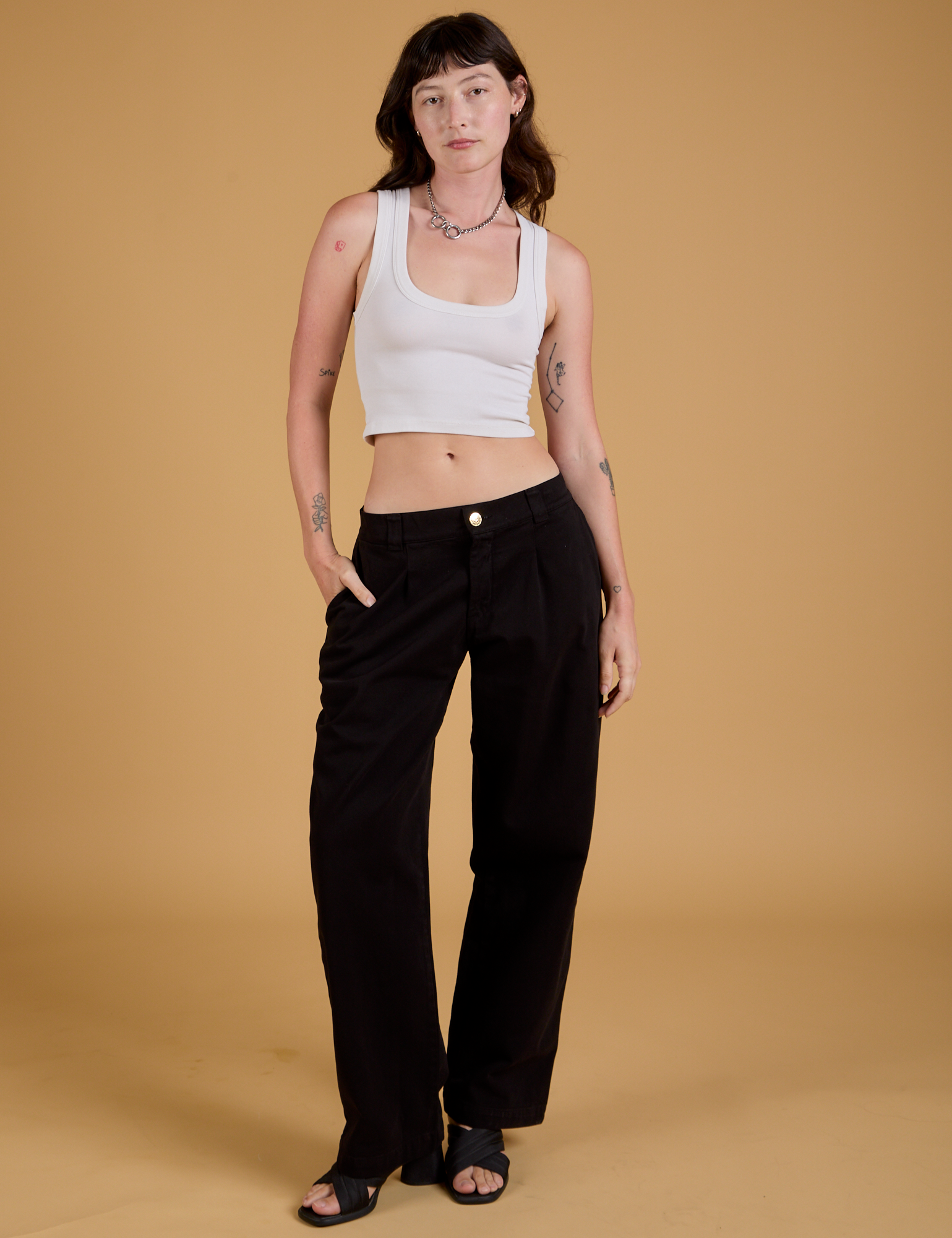 Baggy Mid-Rise Trousers in Basic Black and Cropped Tank in Vintage Tee White on Alex