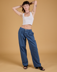 Baggy Mid-Rise Trousers in French Blue and vintage tee white Cropped Tank on Alex