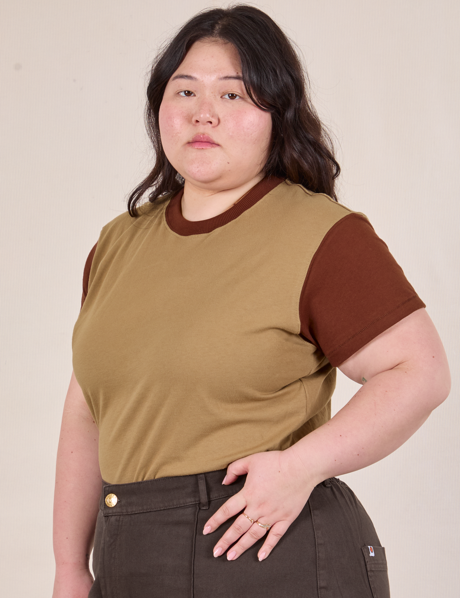 Angled front view of Mismatched Tee in Tan & Brown on Ashley