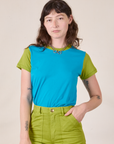 Alex is 5’8” and wearing P Mismatched Tee in Blue & Green