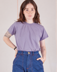 Hana is 5'3" and wearing P Organic Vintage Tee in Faded Grape tucked into dark wash Carpenter Jeans