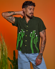 Jesse is 5'8" and wearing XS Paintstamped Pantry Button-Up in Cactus