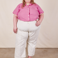 Catie is wearing Pantry Button-Up in Bubblegum Pink and vintage off-white Western Pants