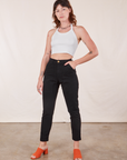 Alex is 5'8" and wearing XXS Pencil Pants in Basic Black paired with Halter Top in vintage tee off-white