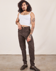 Jesse is wearing Pencil Pants in Espresso Brown and Cropped Cami in vintage tee off-white