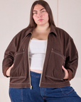 Marielena is 5'8" and wearing 1XL Mechanic Jacket in Fudgesicle Brown