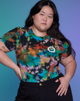 Ashley is 5'7" and wearing L Classic Tee in Rainbow Magic Waters