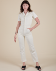 Alex is 5'8" and wearing XS Short Sleeve Jumpsuit in Vintage Tee White