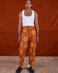 Paintstamped Work Pants in Orange and Cropped Tank in vintage tee off-white on Jerrod