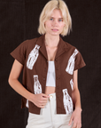Madeline is 5'9" and wearing P Soda Bottle Pantry Button-Up in Fudgesicle Brown