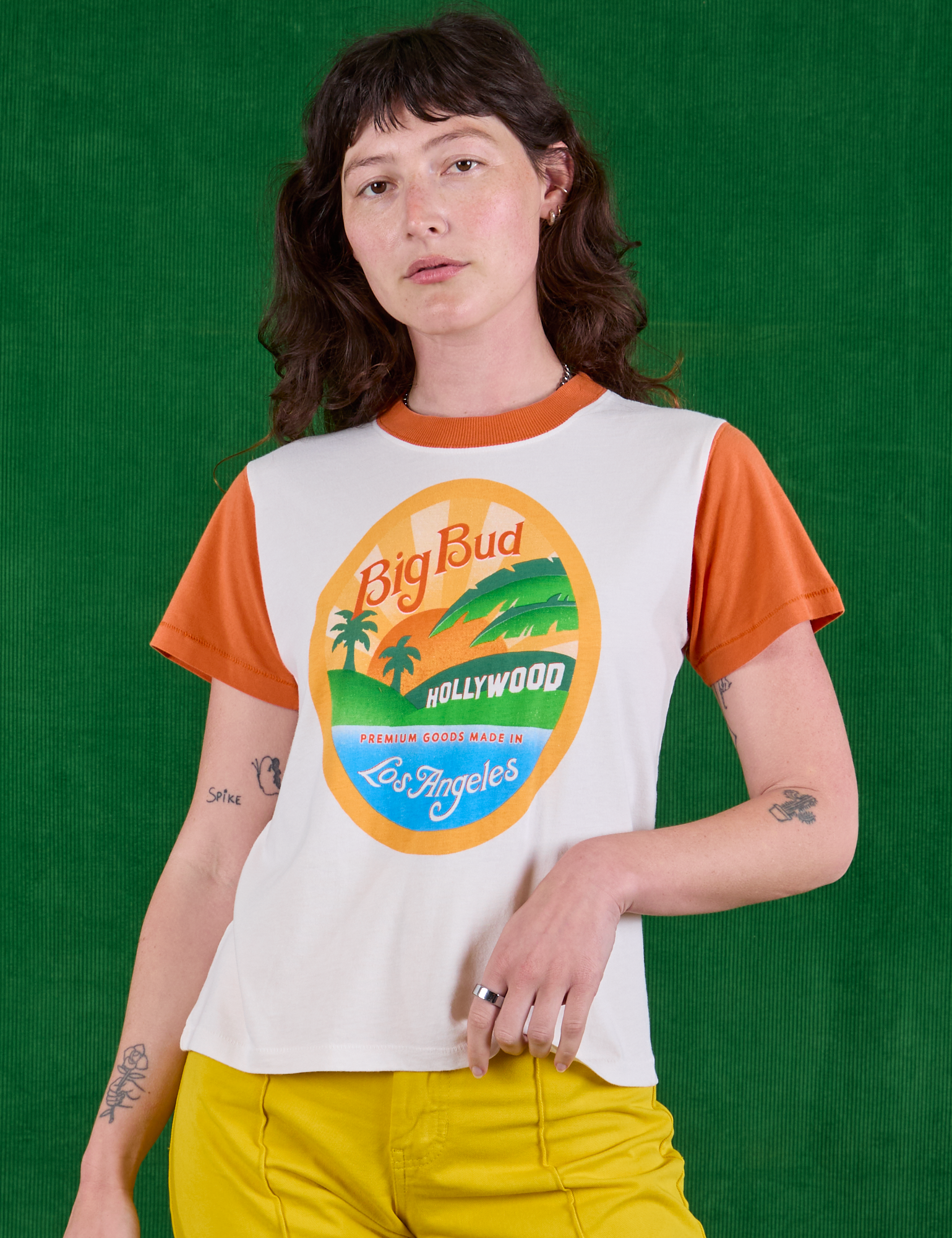 Alex is 5'8" and wearing P Hollywood Tourist Tee