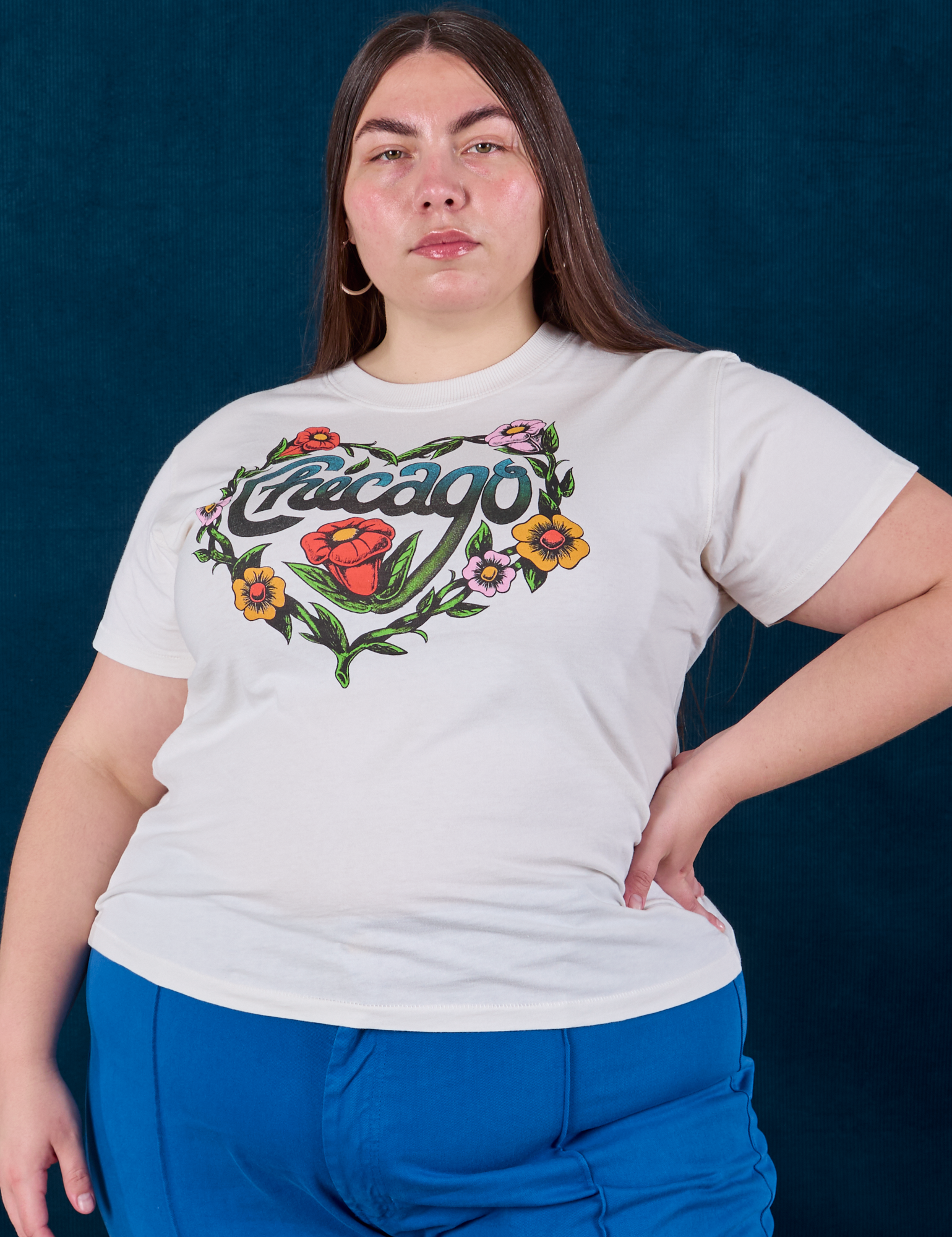 Marielena is 5'8" and wearing L Chicago Tourist Tee