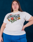 Marielena is 5'8" and wearing L Chicago Tourist Tee