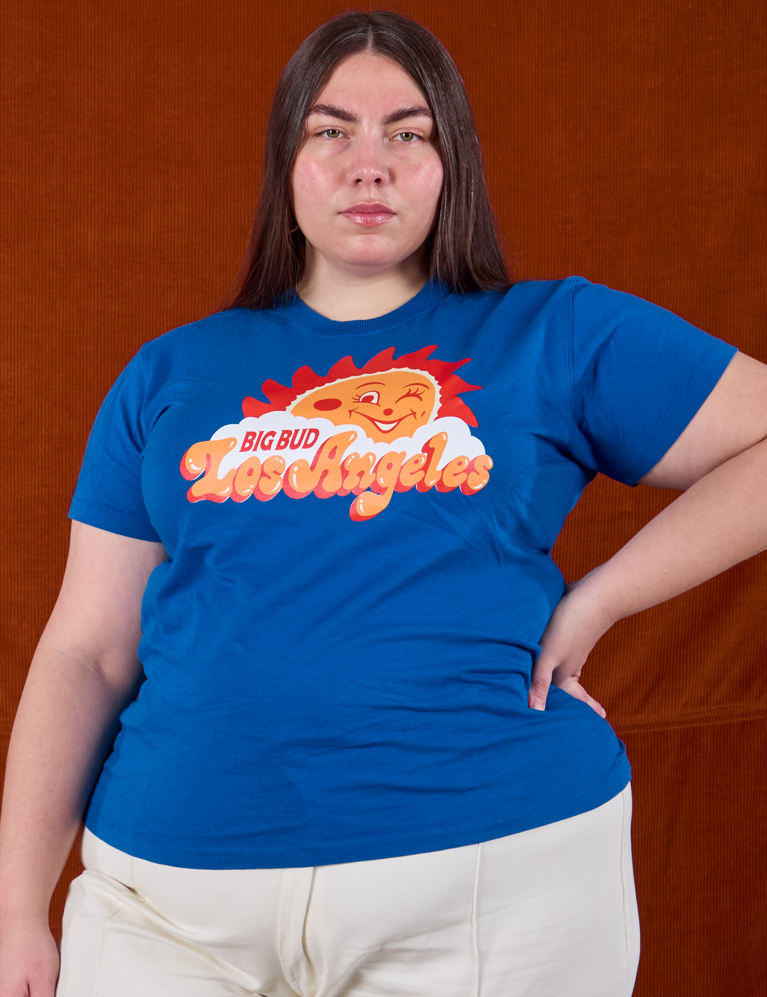 Marielena is 5'8" and wearing L Sunny Los Angeles Tourist Tee