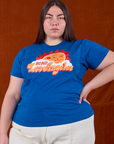 Marielena is 5'8" and wearing L Sunny Los Angeles Tourist Tee