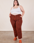 Marielena is wearing Black Striped Work Pants in Paprika and vintage off-white Cropped Cami.