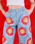 Wide Leg Denim Trousers in Painted Flowers front close up on Alex
