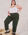 Marielena is wearing Heavyweight Trousers in Swamp Green and vintage tee off-white Cami