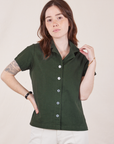 Hana is 5'3" and wearing P Pantry Button-Up in Swamp Green