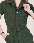 Petite Short Sleeve Jumpsuit in Swamp Green front close up on Hana