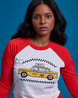 Taxi Raglan Tee in NYC with red sleeves worn by Kandia