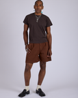 Pleated Trouser Shorts in Fudgesicle Brown and espresso brown Organic Vintage Tee on Jerrod