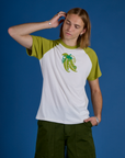 Grant is 6’5” and wearing L Produce Raglan Tee in Snap Peas