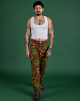 Jesse is wearing Floral Painted Work Pants in Brown and Cropped Tank in Vintage Tee White