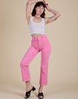 Alex is wearing Work Pants in Bubblegum Pink and vintage tee white Cropped Tank