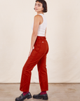 Work Pants in Paprika side view on Soraya wearing a Tank Top in vintage tee off-white