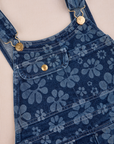 Carpenter Overalls in Lazy Daisy front close up. White top stitching and brass details.