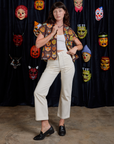 Alex is wearing Halloween Masks Pantry Button-Up paired with vintage tee white Work Pants