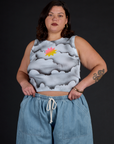 Kristen wearing the Dark Cloud Airbrush Muscle Tee with Light Wash Denim Drop Pocket Pants