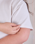 Cropped Burly Tee in Vintage Tee White sleeve close up on Ashley
