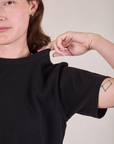 Cropped Burly Tee in Basic Black close up on Alex