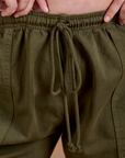 Drop Pocket Cargo Pants in Surplus Green close up of cotton drawstring and elastic waistband