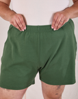 Easy Shorts in Dark Emerald Green front close up on Miguel
