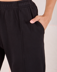 Easy Western Pants in Basic Black close up of Tiara's hand in the pocket