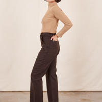 Work Pants in Espresso Brown side view on Soraya wearing tan Essential Turtleneck