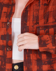 Plaid Flannel Overshirt in Paprika close up on Alex
