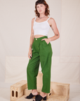 Angled view of Heavyweight Trousers in Lawn Green and Cropped Cami in vintage tee off-white worn by Alex