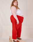 Side view of Heavyweight Trousers in Mustang Red worn by Catie