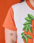 Anniversary Tee in Orange Blossom shoulder close up on Ashley