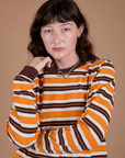 Long Sleeve Striped Burly Tee in Orange worn by Alex