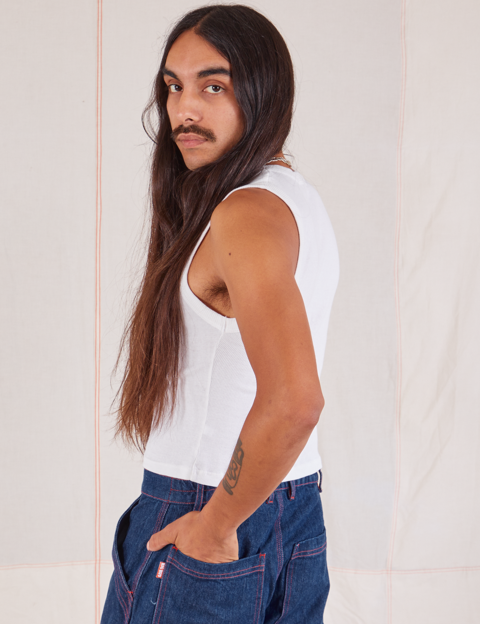 Muscle Tee in Vintage Tee Off-White side view on Anthony